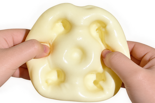 Hands squeezing The Cheesy Squishly on a transparent background